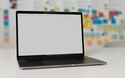 Macbook pro on white table