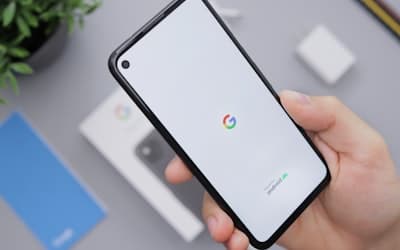 Person holding black android smartphone