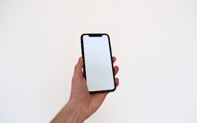 Person holding black iphone 7