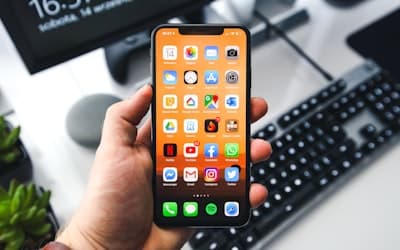 Black samsung android smartphone turned on displaying icons
