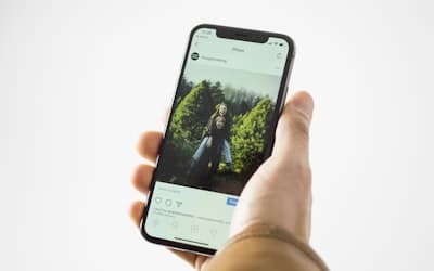 Person using black smartphone