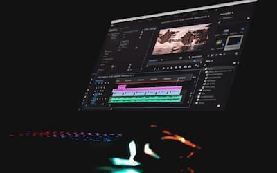 A computer monitor displaying video editing software with a timeline and preview window