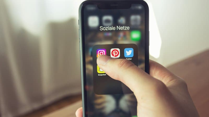 Content creator repurposing TikTok content across multiple social media platforms