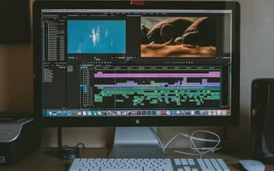 Black iMac, Apple Magic Keyboard, and Apple Magic Mouse